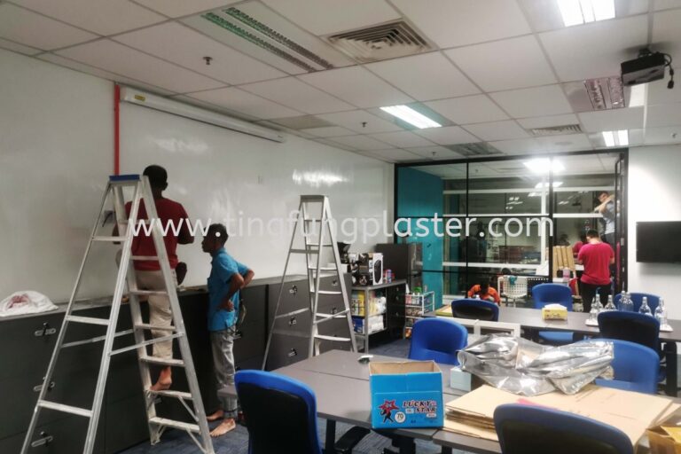 Office renovation in progress with maintenance work.