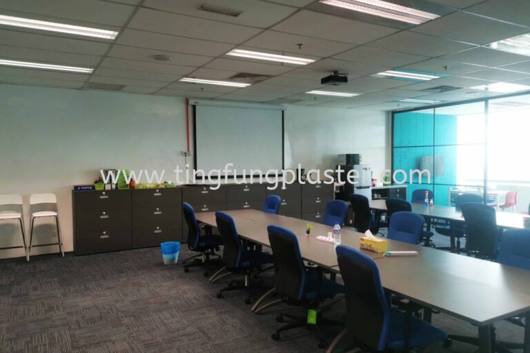 Meeting room with long tables and blue chairs at MEDB Economic Berhad at Empire Subang