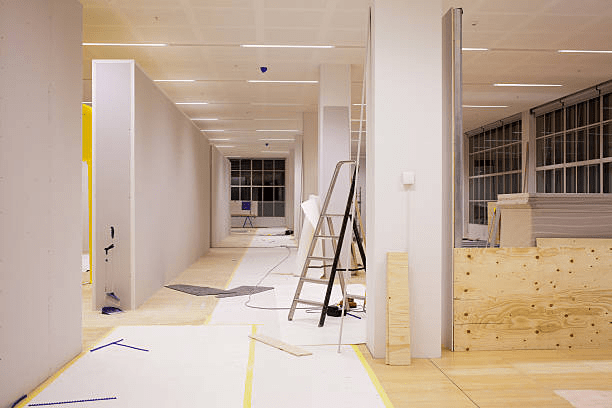 Office renovation work in progress with construction materials