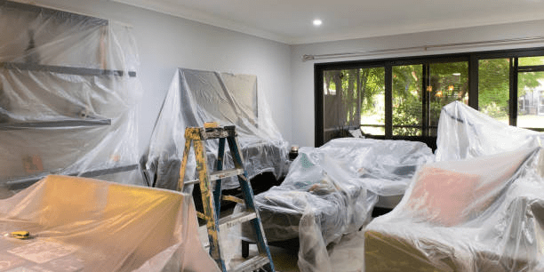 living-room-covered-with-plastic-for-painting room covered with plastic during renovation