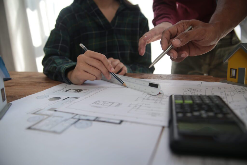 Team planning office renovation costs per square foot in Malaysia.
