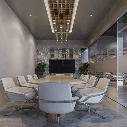 Modern conference room with oval table, white swivel chairs, and large display screen.